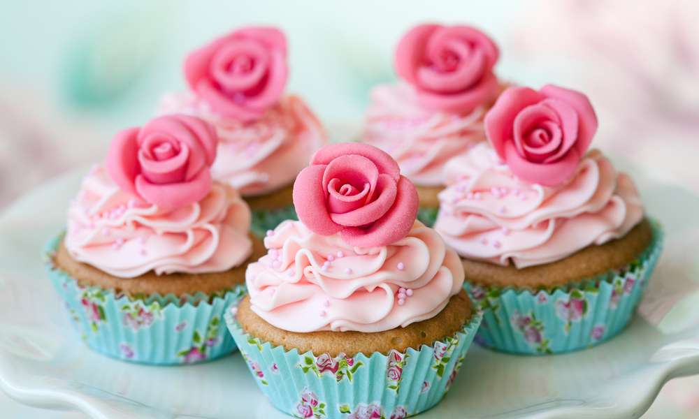 Cupcakes decorated with sugar roses